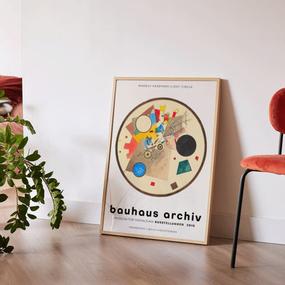 Abstract geometric artwork Light Circle by Wassily Kandinsky from Bauhaus exhibition poster displayed at Bauhaus Archiv Museum, framed and displayed in home decor