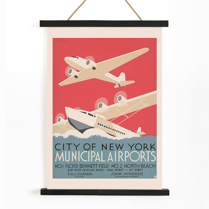 Vintage poster of stylized airplanes flying over water for City of New York municipal airports featuring bold artwork title and locations Floyd Bennett Field and North Beach, with wooden magnetic frame on white background