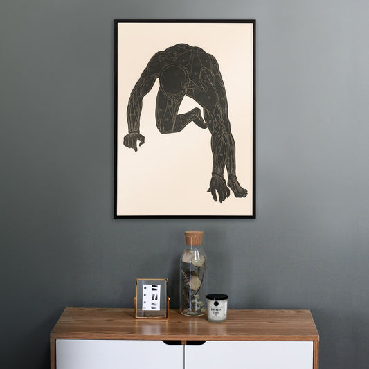 Anatomical illustration of human muscular anatomy and crouching figure from Neck Muscles by Reijer Stolk, framed and displayed in home decor