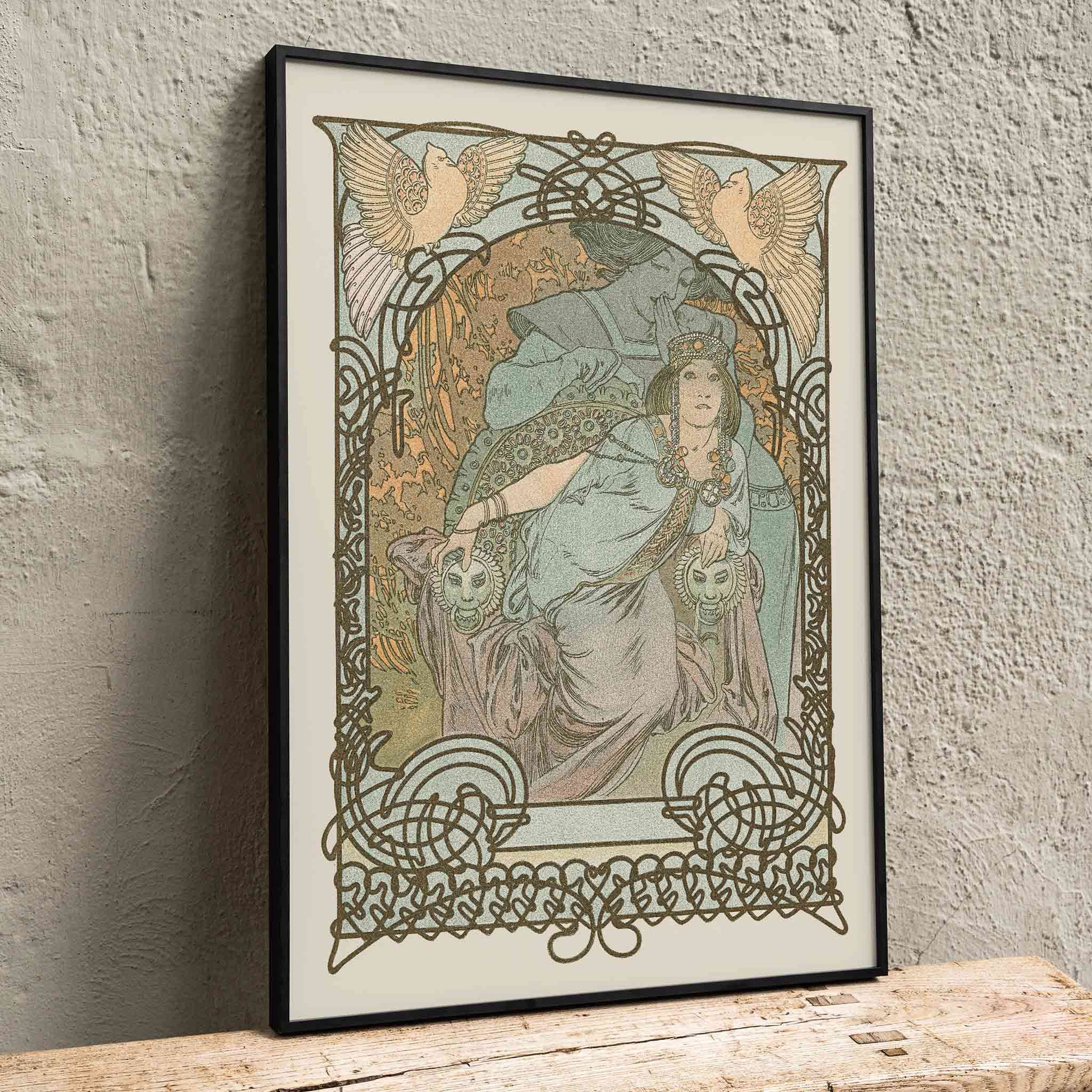 Alphonse Mucha Ilsee Princesse de Tripoli poster with elegant woman in flowing robes ornate floral lines and soft pastel tones, framed and displayed in home decor