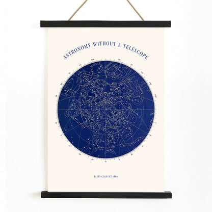 Star map and poster of constellations titled Astronomy without a Telescope by Elias Colbert featuring celestial star chart in blue, with wooden magnetic frame on white background