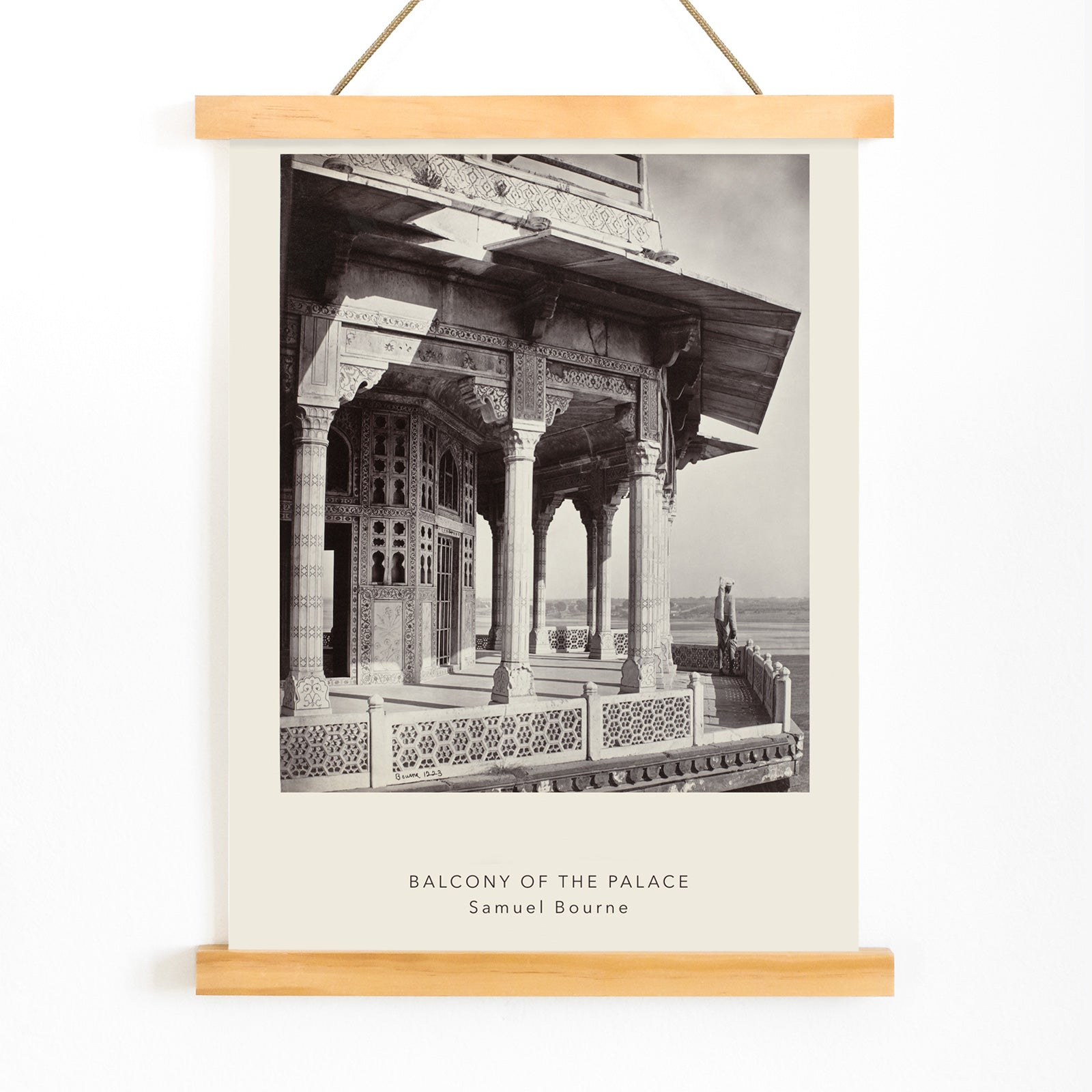 Architectural photography and poster of ornate palace balcony with intricate columns and carvings by Samuel Bourne titled Balcony of the Palace, with wooden magnetic frame on white background