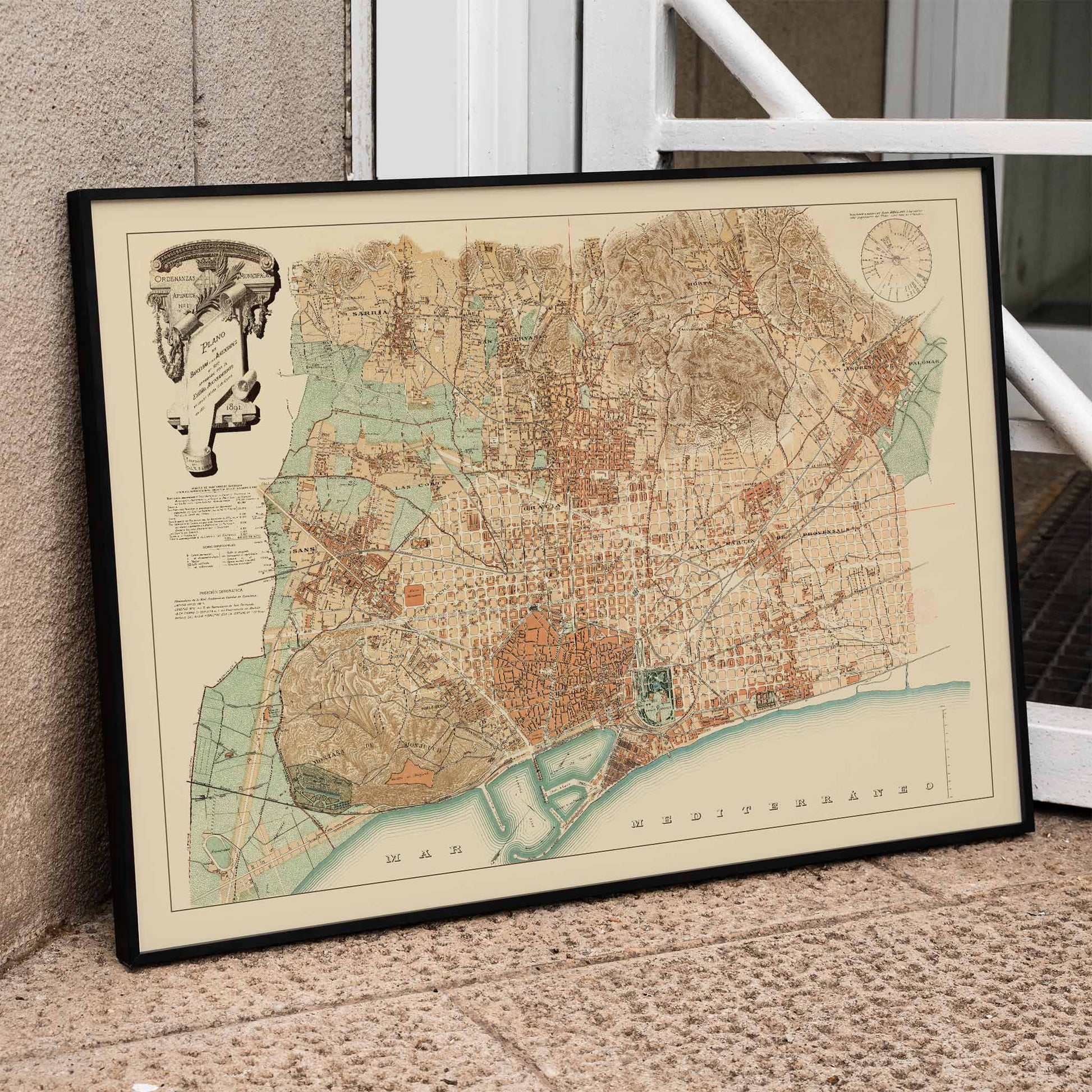 Anonymous Plan of Barcelona and surroundings vintage poster, sepia city map with coastal lines and pastel districts, framed and displayed in modern living room decor