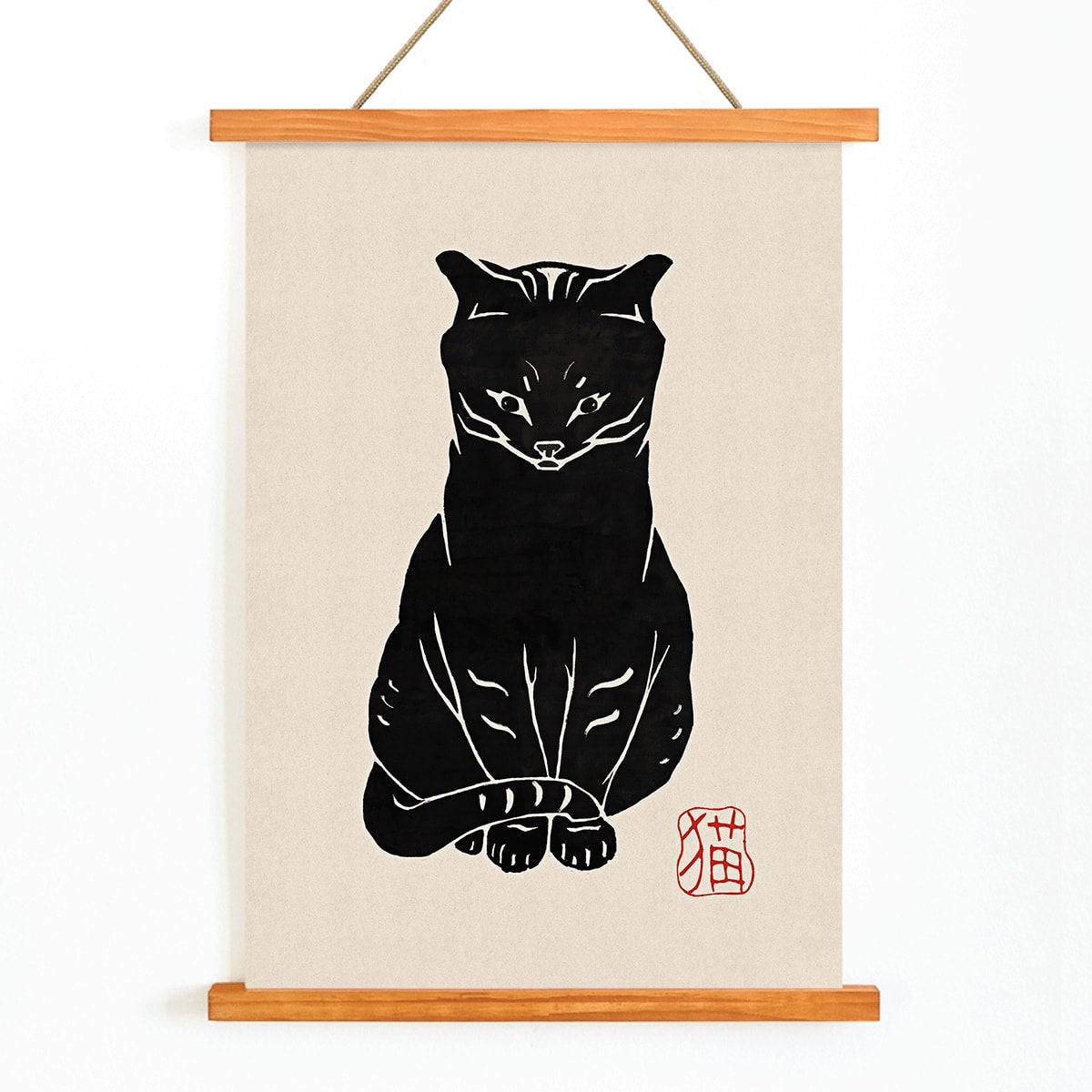 Black Cat artwork by unknown artist and Anonymous featuring a stylized minimalist black cat on beige background with red stamp detail, with wooden magnetic frame on white background