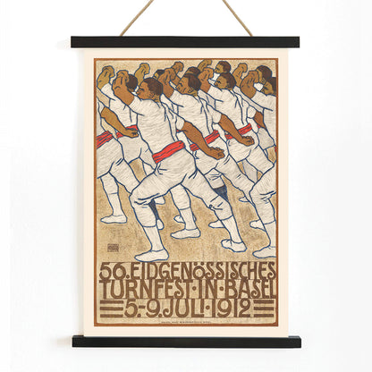 Federal Gymnastics Festival in Basel by Eduard Renggli showing male athletes in white uniforms with red sashes performing synchronized movements in formation, with wooden magnetic frame on white background