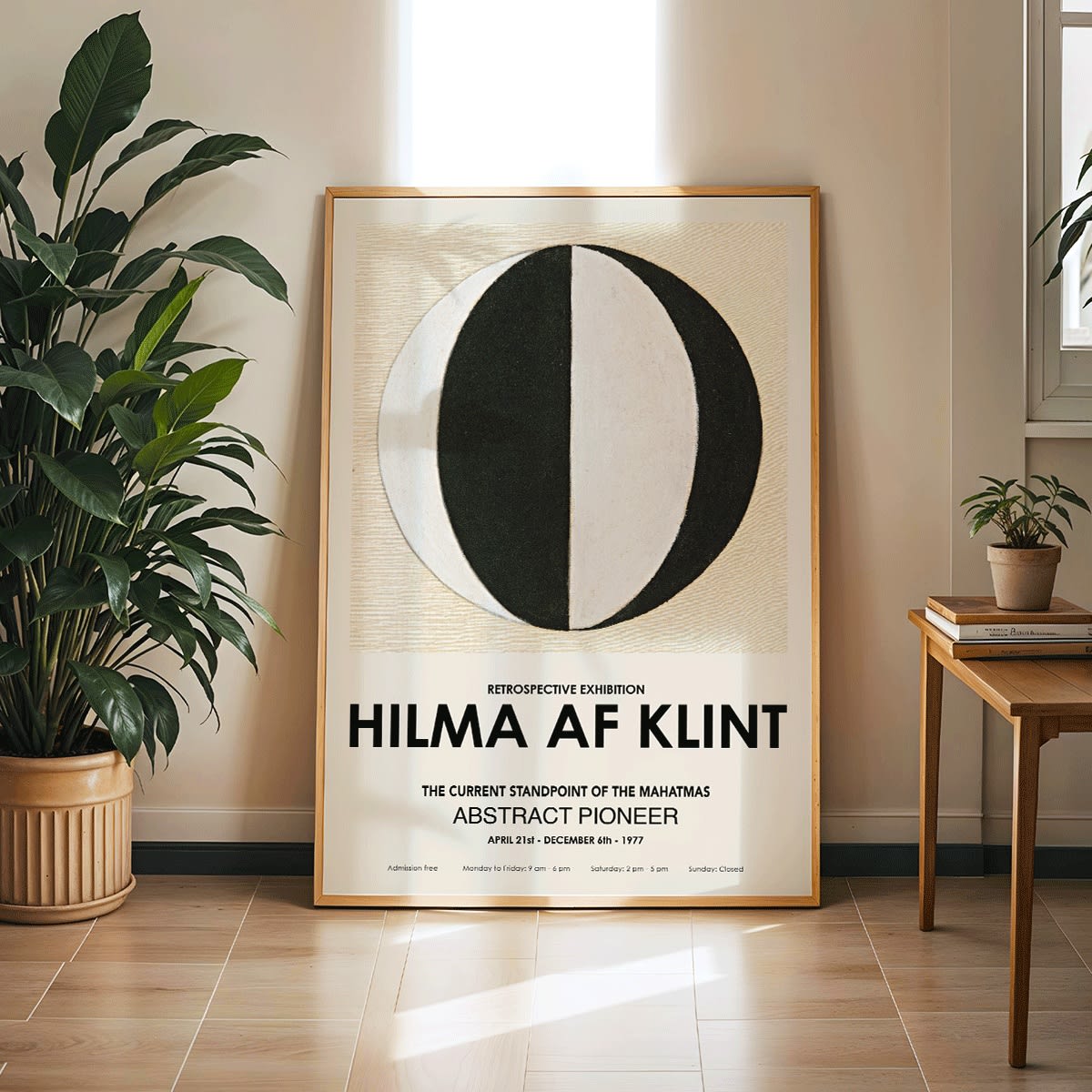 Abstract artwork The Current Standpoint of the Mahatmas by Hilma Af Klint featuring geometric shapes and a black and white abstract circular design poster, framed and displayed in modern living room decor