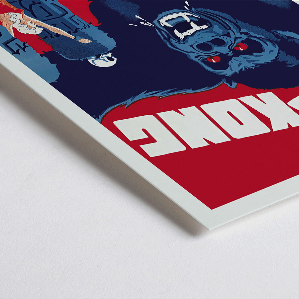 Closeup detail of King Kong movie poster by Boye showing giant gorilla with red eyes grabbing a building and a woman in a red dress in an iconic scene