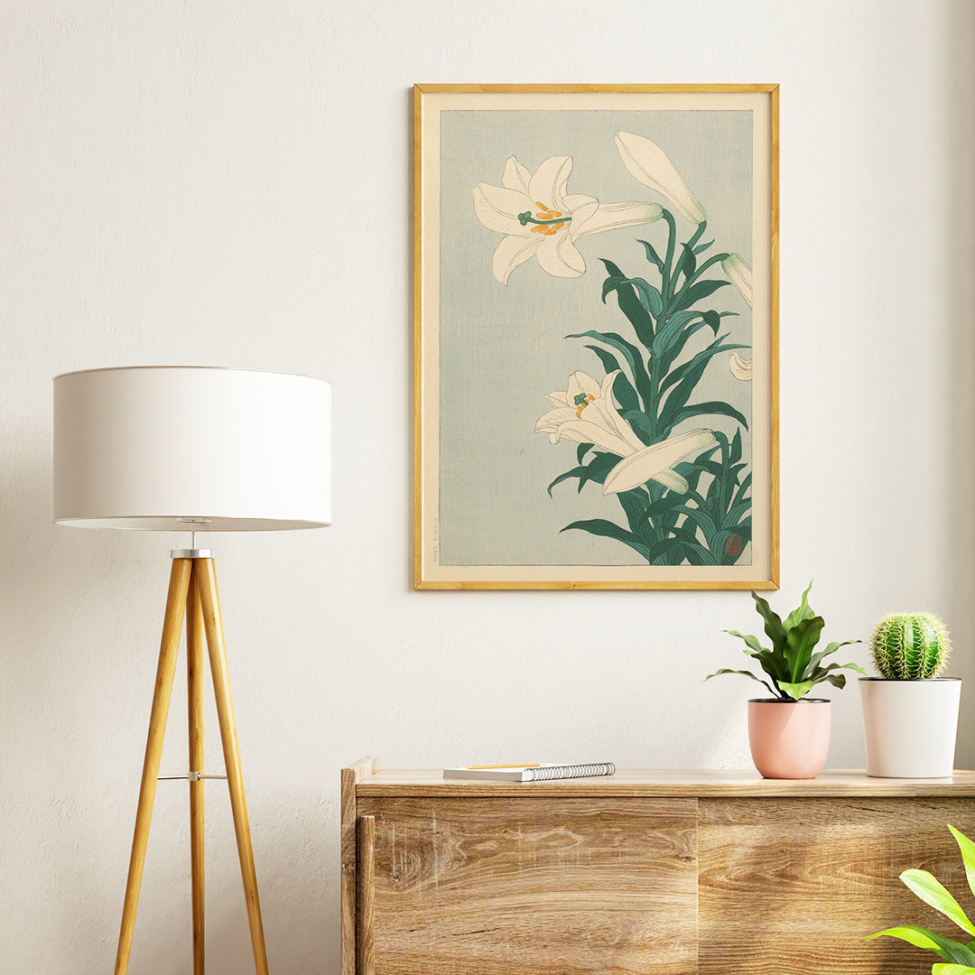 White lilies floral artwork by Ohara Koson with green leaves on light blue background poster Lelies flowers, framed and displayed in home decor