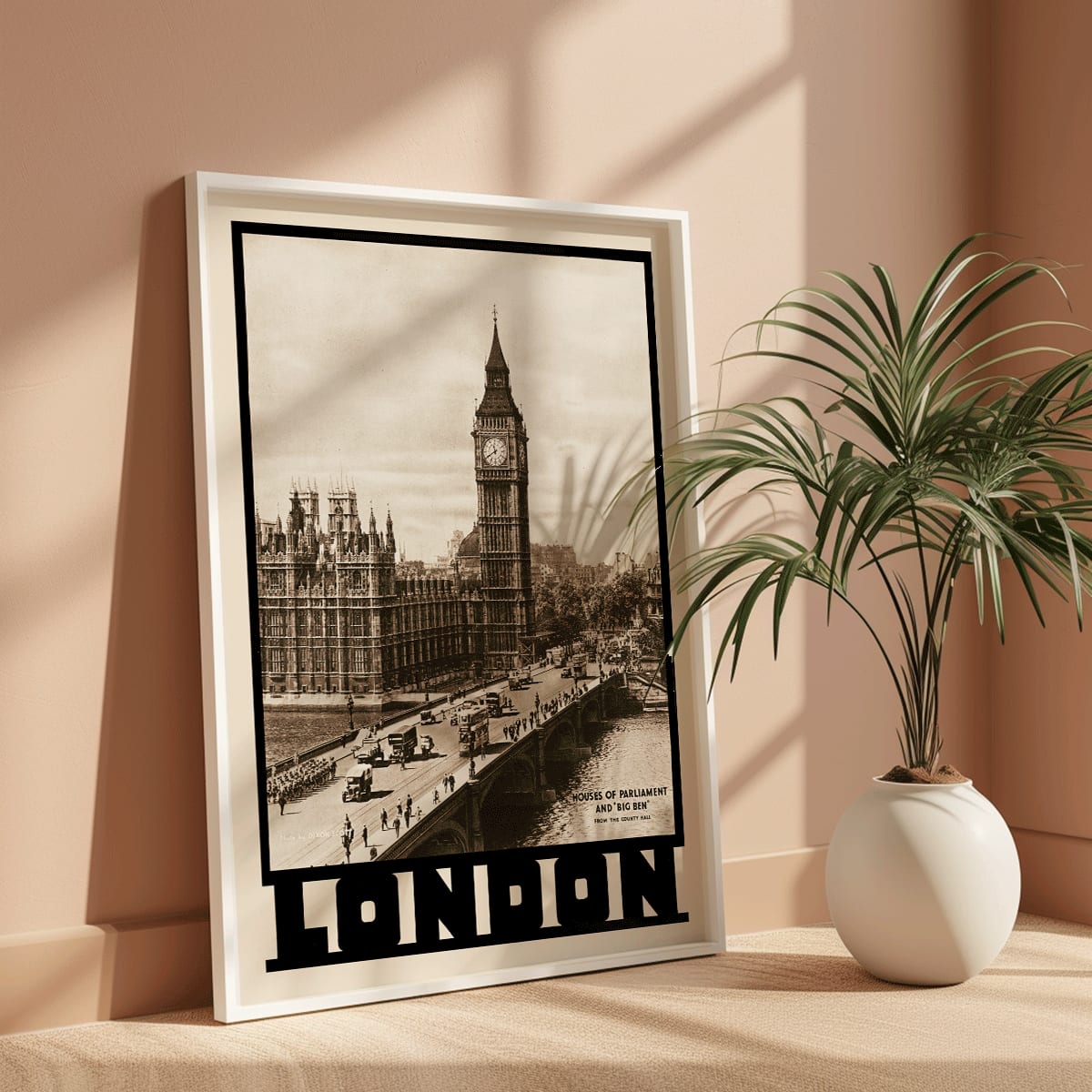 Vintage view and poster of Houses of Parliament and Big Ben in London by Dixon Scott featuring iconic landmarks with sepia toned imagery, framed and displayed in modern living room decor