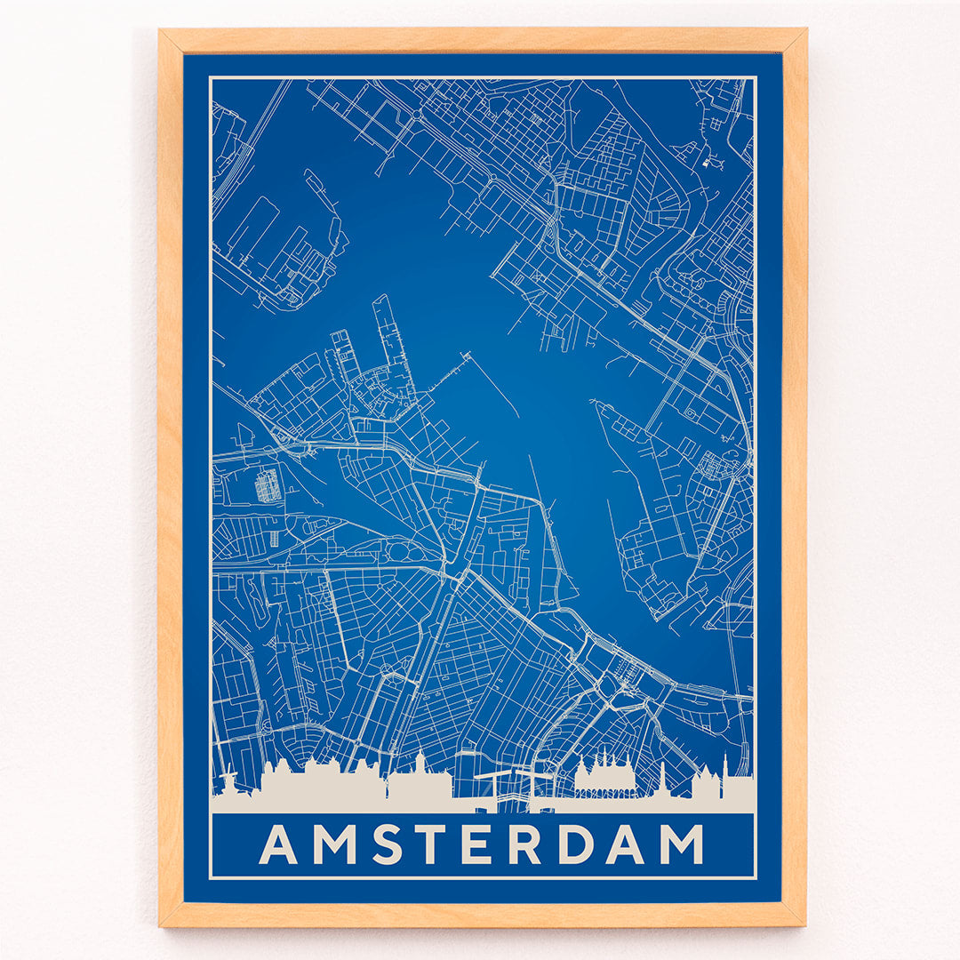 Amsterdam minimalist map artwork poster in blue and white showing detailed city streets and waterways, framed and displayed in modern living room decor