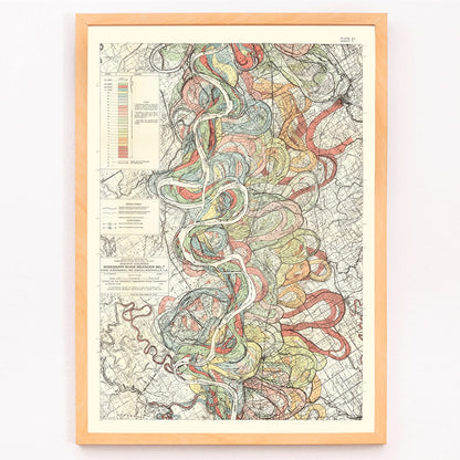 Colorful poster map of the Mississippi River by Harold Fisk titled Alluvial Valley of the Mississippi River showing historical meanders and vibrant river patterns, framed and displayed in modern living room decor