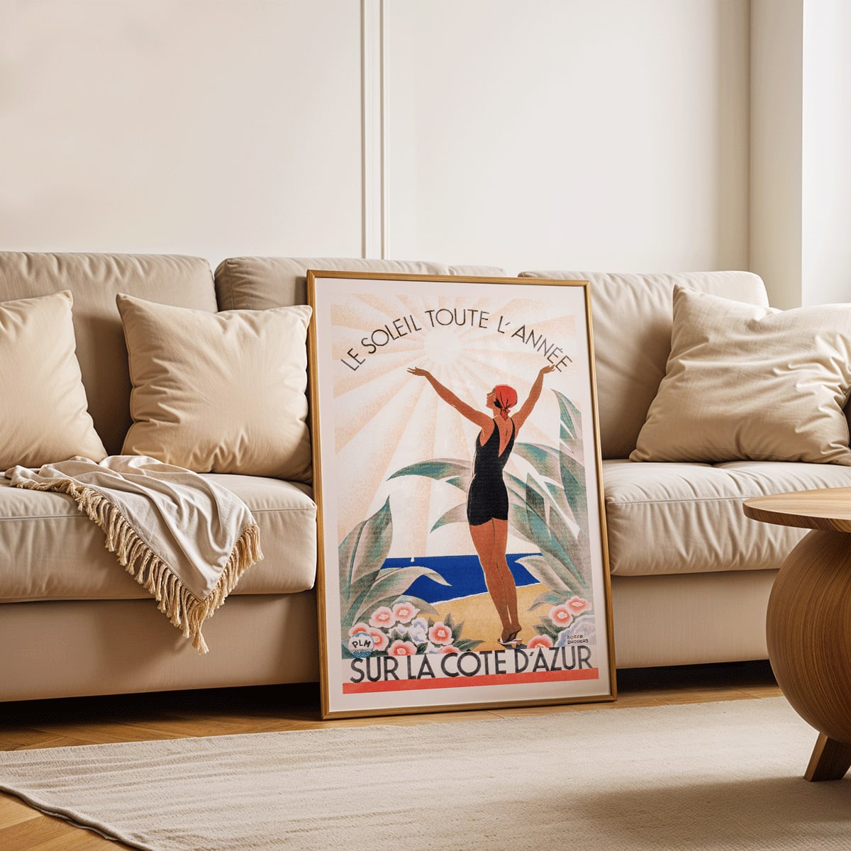 Woman in swimsuit enjoying sunny beach scenery surrounded by flowers Cote dAzur artwork by Roger Broders, framed and displayed in home decor