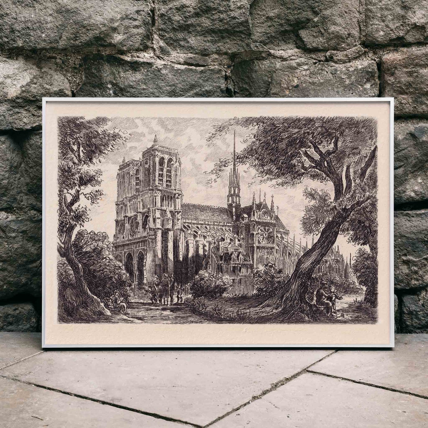 Artistic poster of Notre Dame de Paris cathedral surrounded by trees and people in a scenic landscape, framed and displayed in home decor