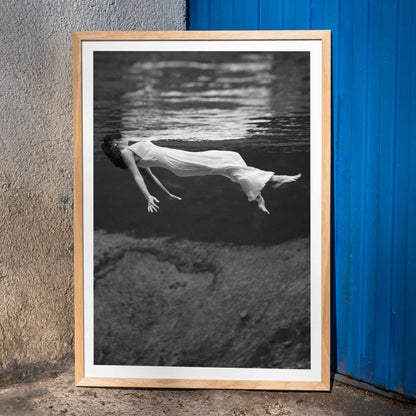 Underwater woman in white flowing dress at Weeki Wachee spring Florida by Toni Frissell, framed and displayed in home decor