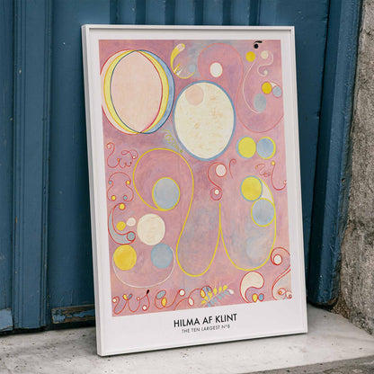 Abstract colorful swirls and pastel shapes on pink background painting and poster from The Ten Largest Adulthood by Hilma AF Klint, framed and displayed in home decor