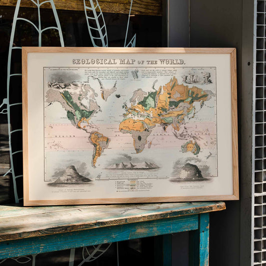 Geological map of the world by James Reynolds with colorful regions and notes poster showing different geological formations, framed and displayed in home decor