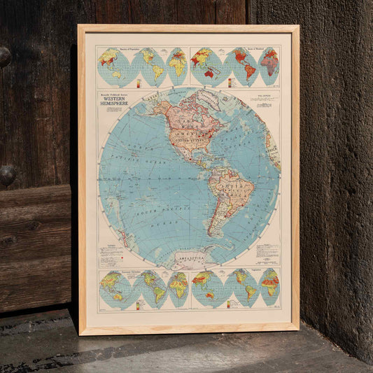 Western Hemisphere map by Rand McNally and Co showing detailed continents oceans and political geographic features, framed and displayed in home decor