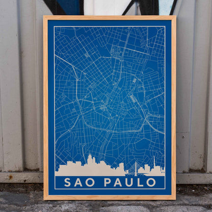 Minimalist blue map of Sao Paulo city with white street lines and skyline by artist Anonymous titled Minimalist Sao Paulo Map, framed and displayed in home decor