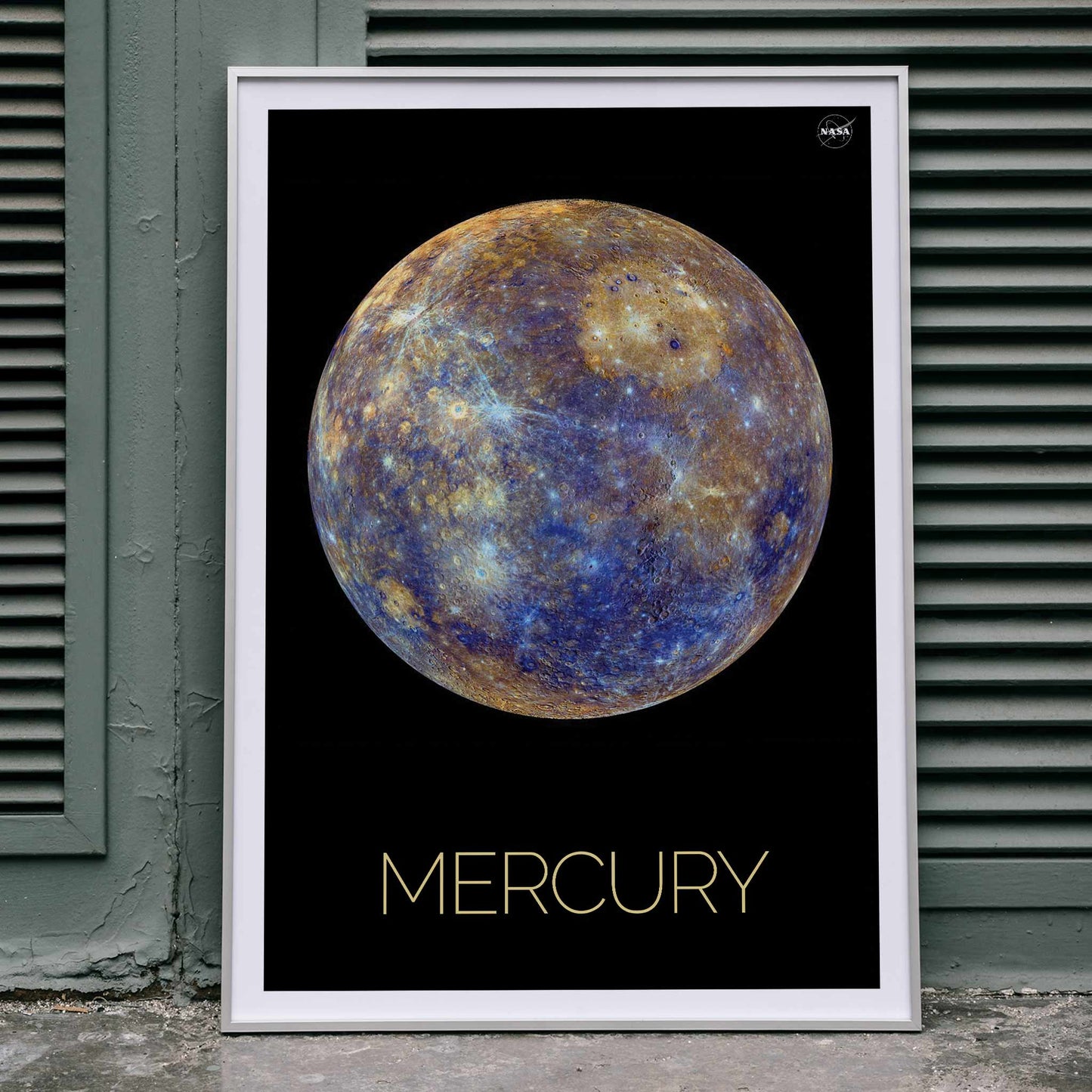NASA Mercury artwork and poster showing the planet in vivid colors and detailed surface against a black background with Mercury title below, framed and displayed in home decor