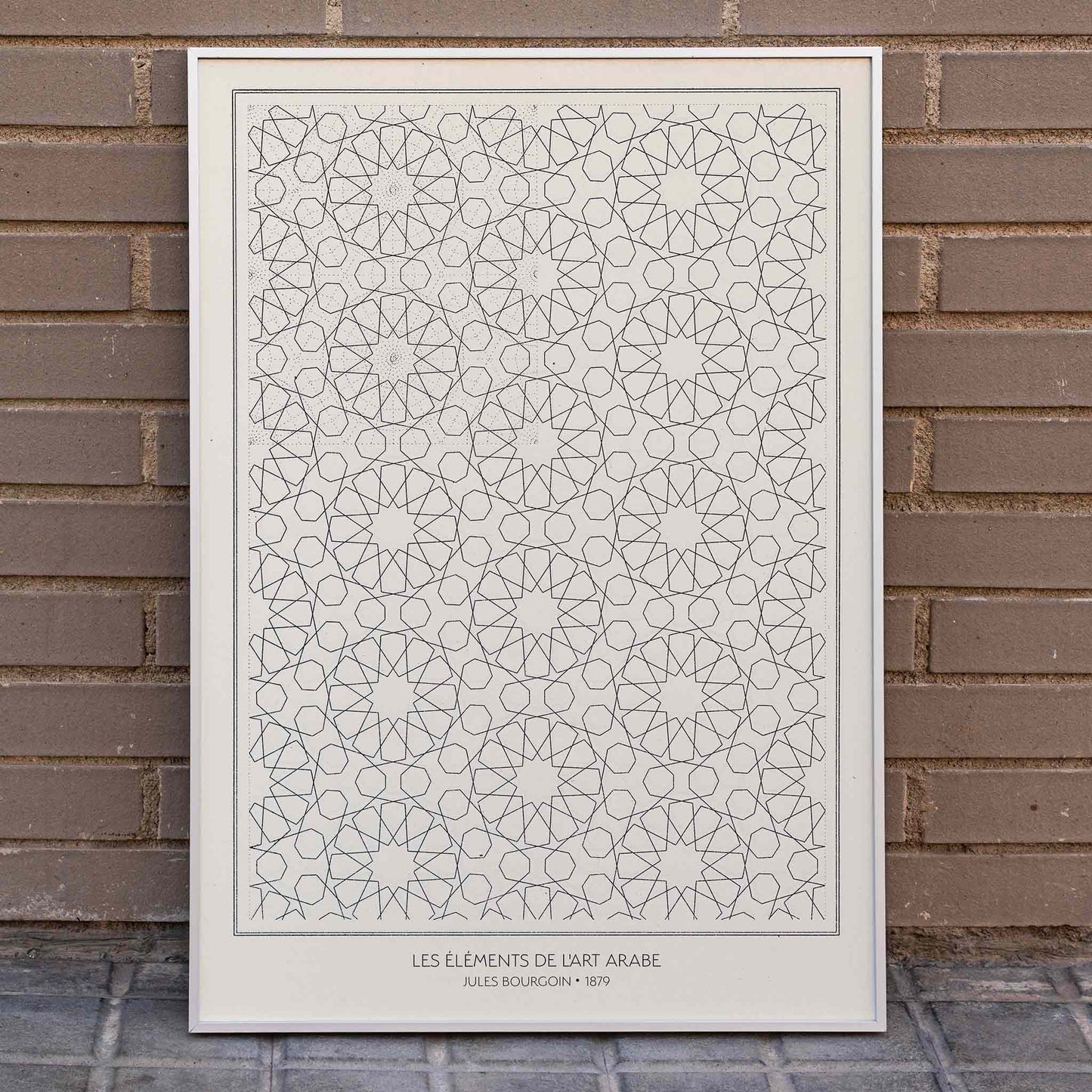 Intricate geometric patterns by Jules Bourgoin from Les elements de l art arabe poster, framed and displayed in home decor