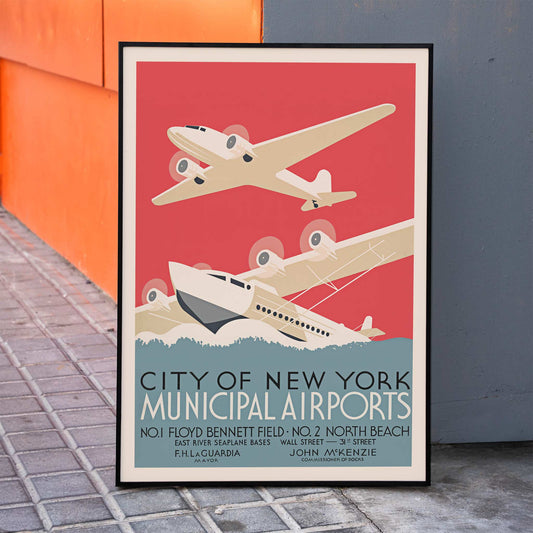 Vintage poster of stylized airplanes flying over water for City of New York municipal airports featuring bold artwork title and locations Floyd Bennett Field and North Beach, framed and displayed in home decor