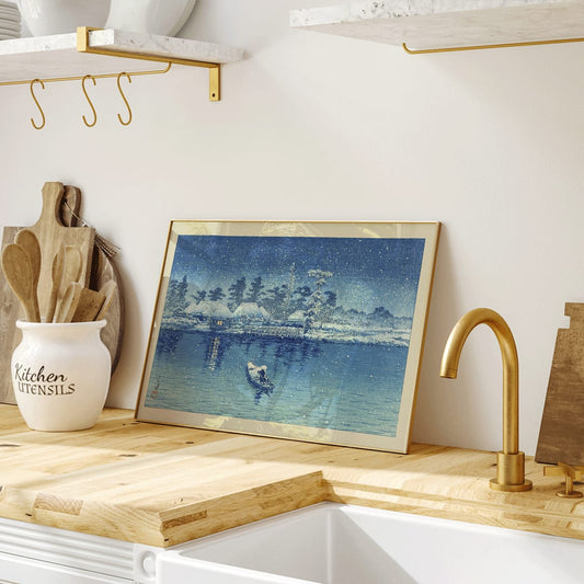 Snowy riverside village at night with boat and person by Kawase Hasui Ushibori Japanese art poster, framed and displayed in home decor