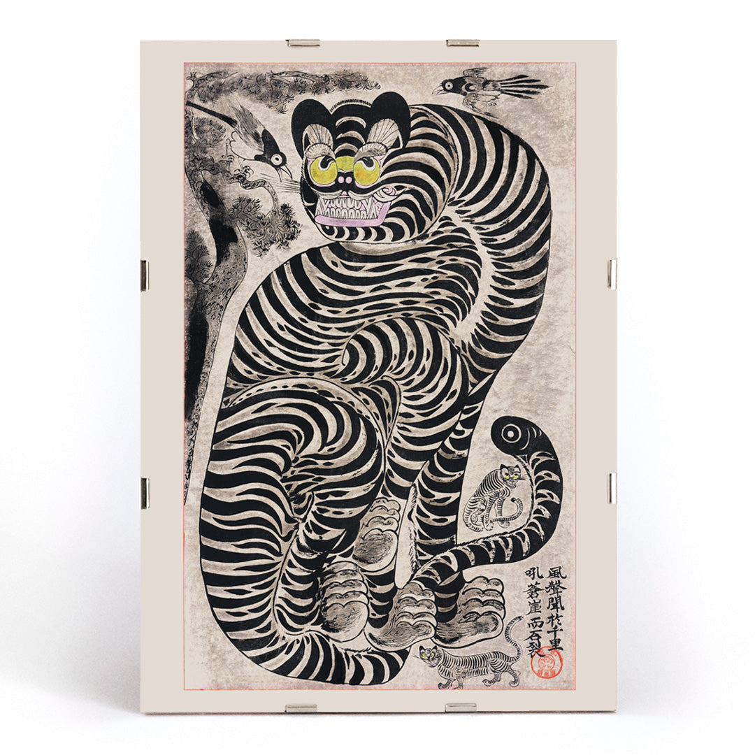 Vintage Japanese style poster of a bold striped tiger with birds by Talismanic tiger perfect for home wall decor, framed and displayed in modern living room decor