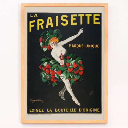 Closeup detail of The Fraisette by Leonetto Cappiello poster featuring a whimsical woman in a strawberry costume holding a bottle of liqueur against a black background